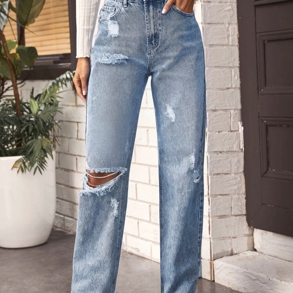 High waisted distressed jeans